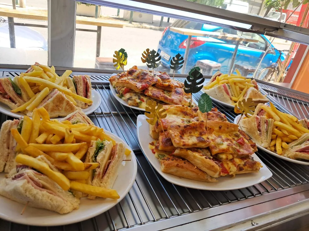 Club sandwiches and pizza at our counter